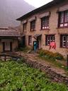 Day 1: Lukla to Monjo.\r\nTypical mountain home with a tasty looking field of greens in front.